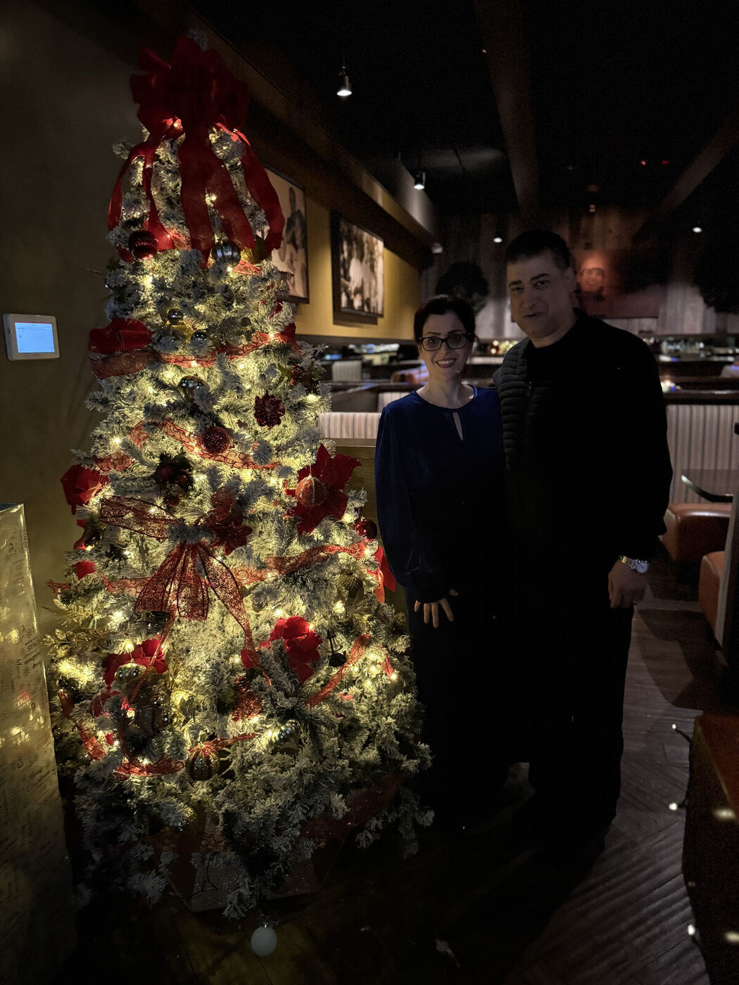 By the Christmas tree at our holiday gathering